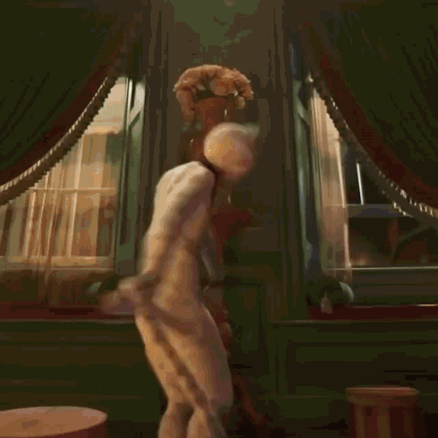 a man dressed as a cat is dancing with his arms outstretched