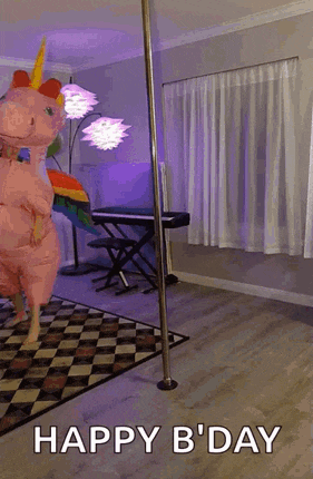 a person in an inflatable unicorn costume is standing on a pole in a living room .
