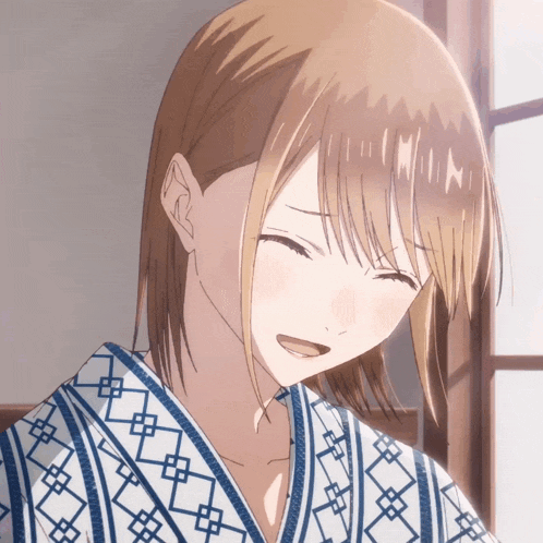 a close up of a girl wearing a kimono