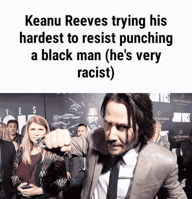 keanu reeves is trying his hardest to resist punching a black man ( he 's very racist)