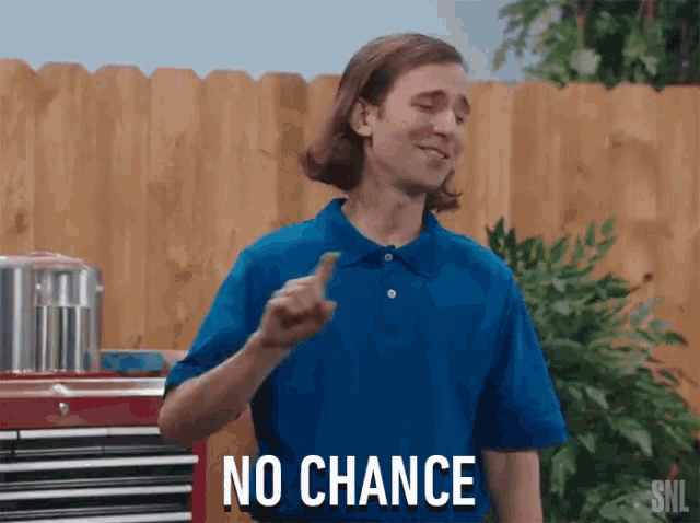 a man in a blue shirt has the word no chance on his chest