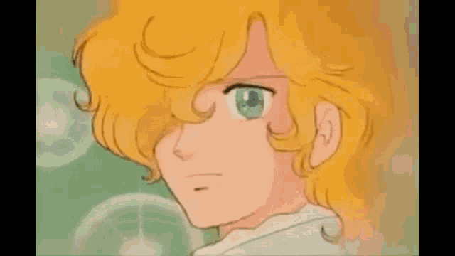 a video of a boy with blonde hair and blue eyes is playing