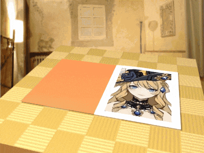 a piece of paper with a picture of a girl on it on a table