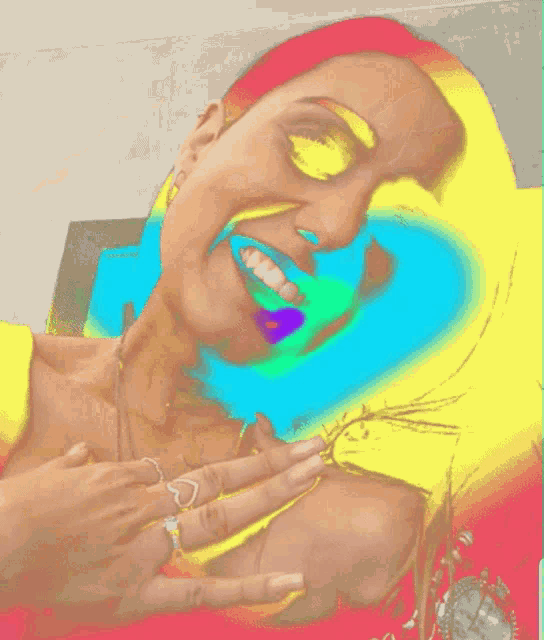 a colorful painting of a woman 's face with a heart in the background