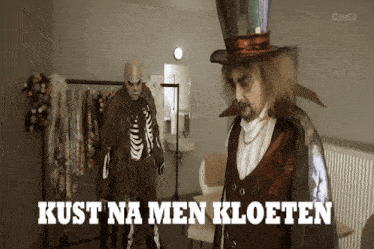 a man in a top hat stands next to a man in a skeleton costume