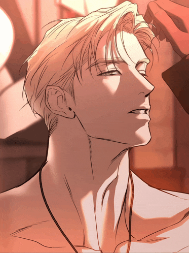 a close up of a man 's face with his eyes closed and a necklace around his neck
