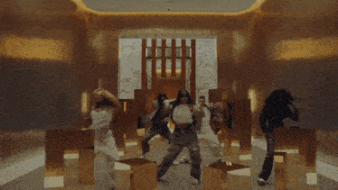 a group of people are dancing together in a room