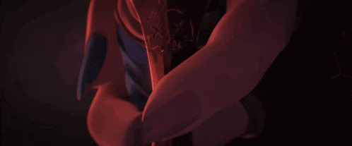 a blue and red light is coming out of a hole