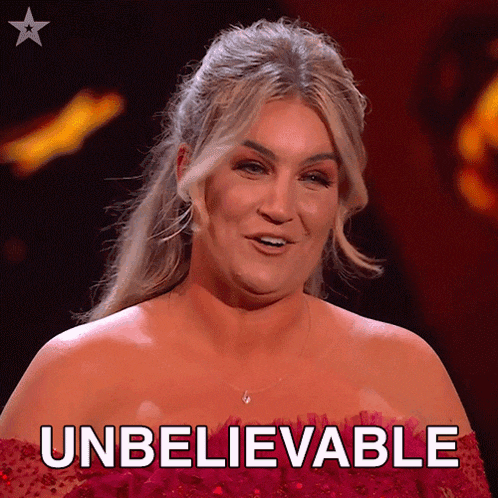 a woman in a red dress says " unbelievable " on a red background