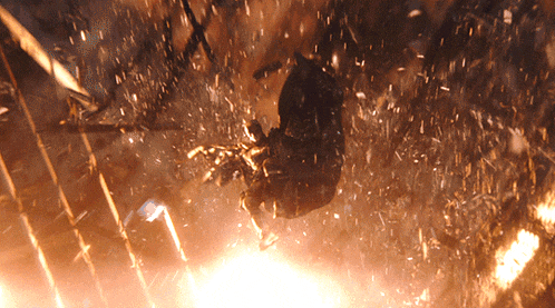 a person is flying through the air with a lot of sparks coming out of it