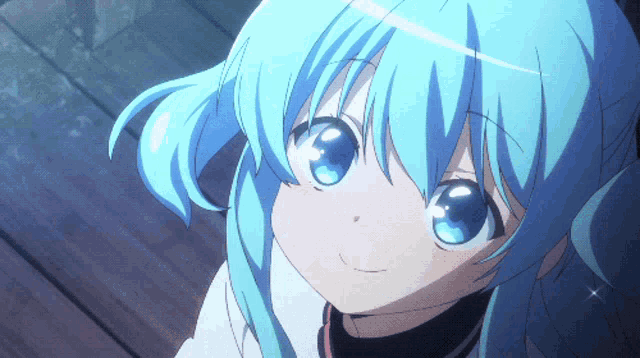 a close up of a girl with blue hair