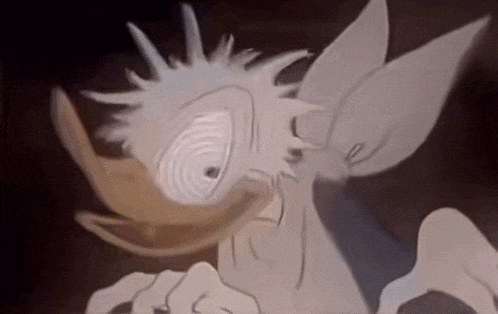 a close up of a cartoon character 's face with a strange expression