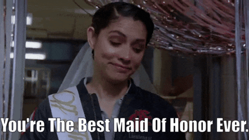 a woman with a sash that says you 're the best maid of honor ever is crying