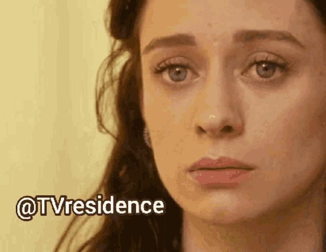 a close up of a woman 's face with the words " @tvresidence " below her