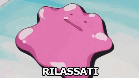 a pink cartoon character is sitting on a blue surface with the words rilassati written above it .