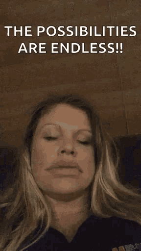 a woman is making a funny face with the words `` the possibilities are endless '' written above her .