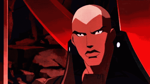 a cartoon character with a shaved head looks at the camera