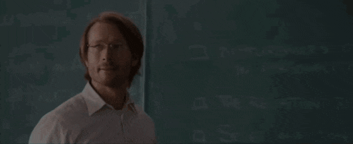 a man stands in front of a chalkboard that says " disturbances in personality "