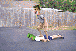 a pixelated image of a man with a green box on his head