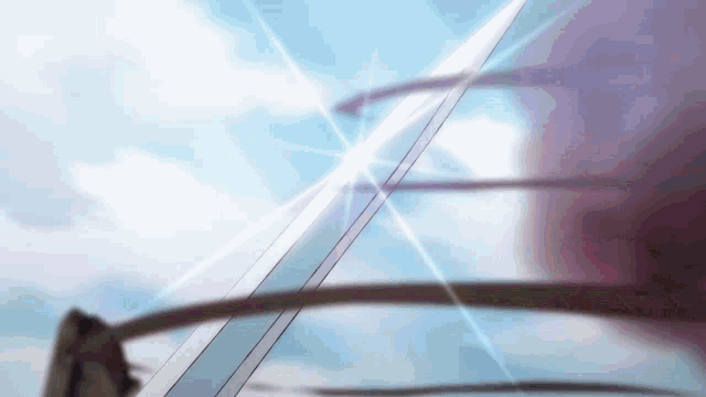 a sword is flying through the air with the sun shining through the clouds
