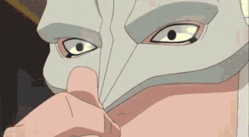a close up of a man 's face with a mask on