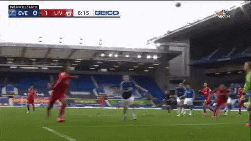 a soccer game is being played in a stadium with a score of 0-1