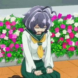 a girl in a school uniform is kneeling down with her eyes closed in front of flowers