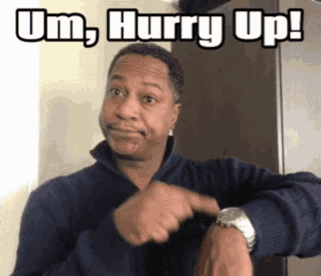 a man is pointing at his watch with the words um hurry up written above him
