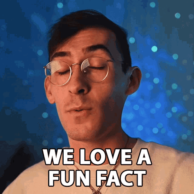 a man wearing glasses and a necklace says we love a fun fact