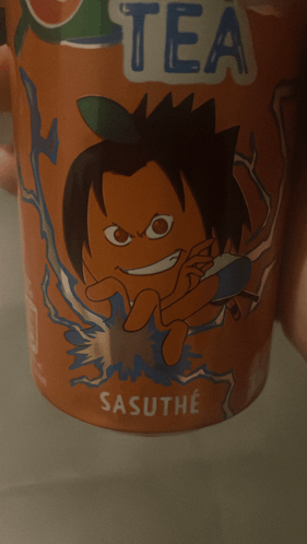 a person is holding a cup of sasuto tea