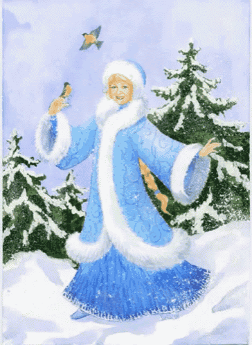 a woman in a blue and white coat is holding a small bird