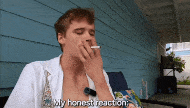 a man smoking a cigarette with the words " my honest reaction " next to him