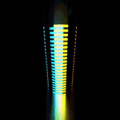 a black background with a yellow and blue striped object in the middle