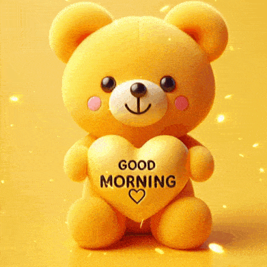 a teddy bear holding a heart that says " good morning "