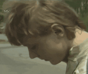 a close up of a person 's face with the letters ms on the bottom right