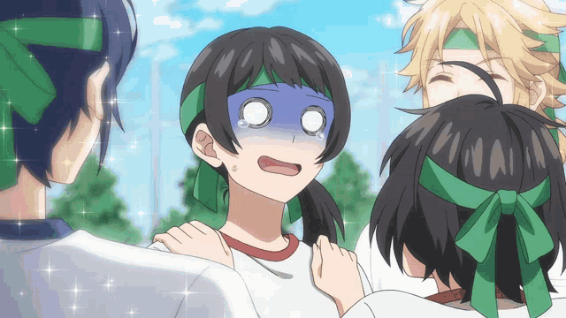 a girl with a green headband on her head