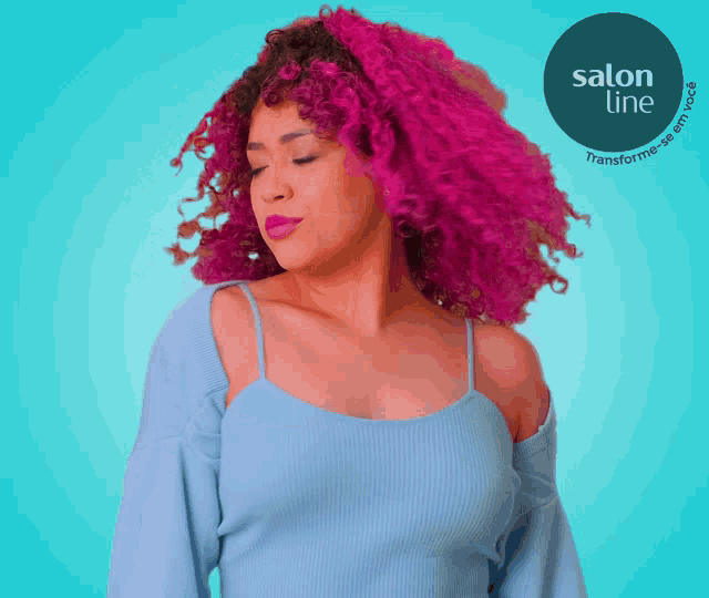 a woman with pink curly hair is standing in front of a blue background that says salon line