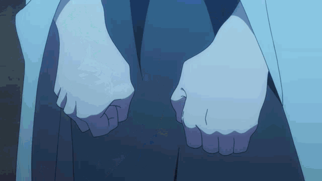 a close up of a person 's feet with a blue button on the cuff