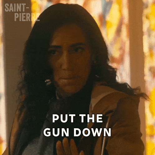 a woman says put the gun down in front of a stained glass window ..