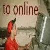 a man is sitting in front of a computer with the words `` to online '' written on the wall .