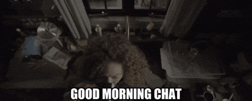 a man is laying on a kitchen counter drinking a cup of coffee with the words " good morning chat " below him