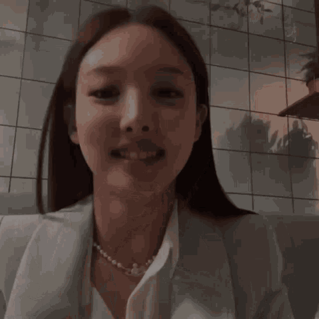 a woman drinking from a cup with the words ani sin debutar on the bottom