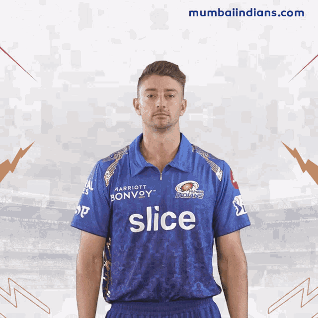 a man wearing a blue shirt with slice on it
