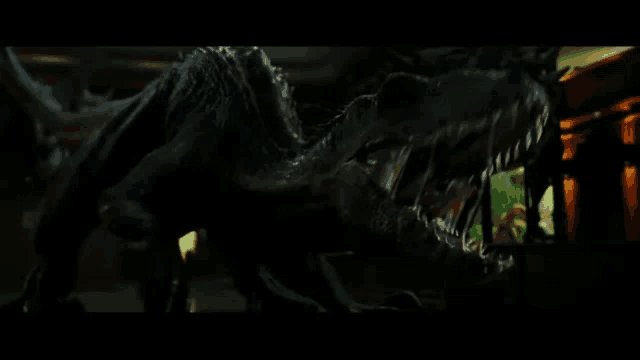a black dinosaur with a large mouth is standing in a dark room