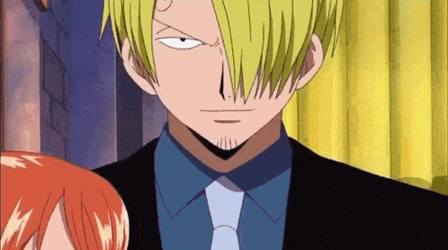 a man with blonde hair and a beard is wearing a blue shirt and tie .