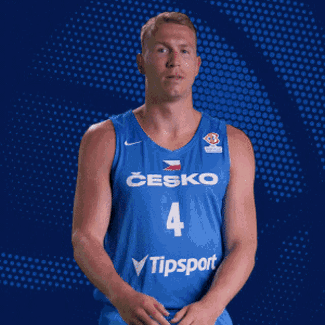a man wearing a blue jersey with the number 4 on it