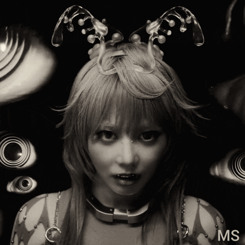 a black and white photo of a woman with the word ms on the bottom