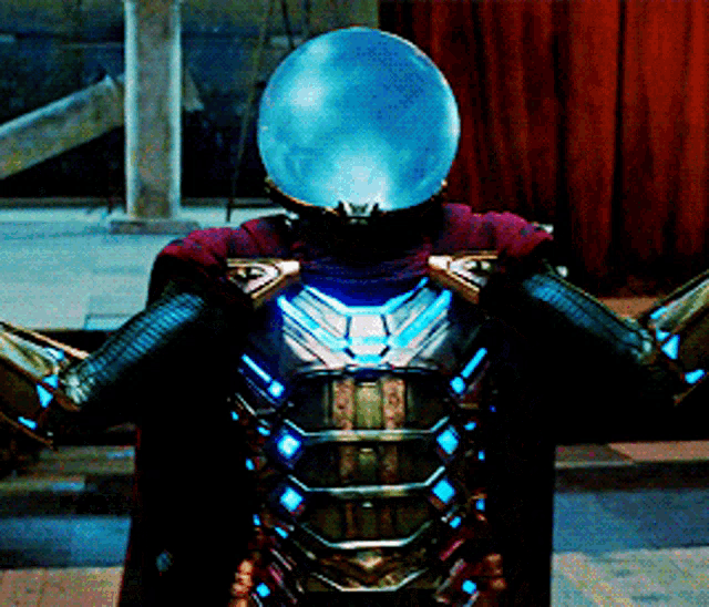 a man in a superhero costume with a blue helmet on his head
