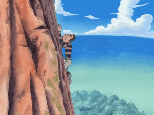 a man in a striped shirt is climbing a rocky cliff