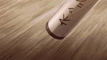 a pencil with chinese writing on it is being thrown